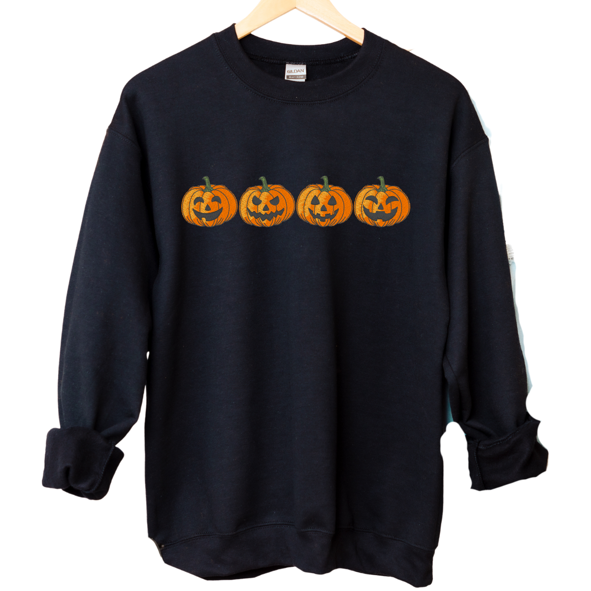 Embroidered Pumpkin Face Fall Halloween Sweatshirt – Cozy Autumn Crewneck for Women & Men